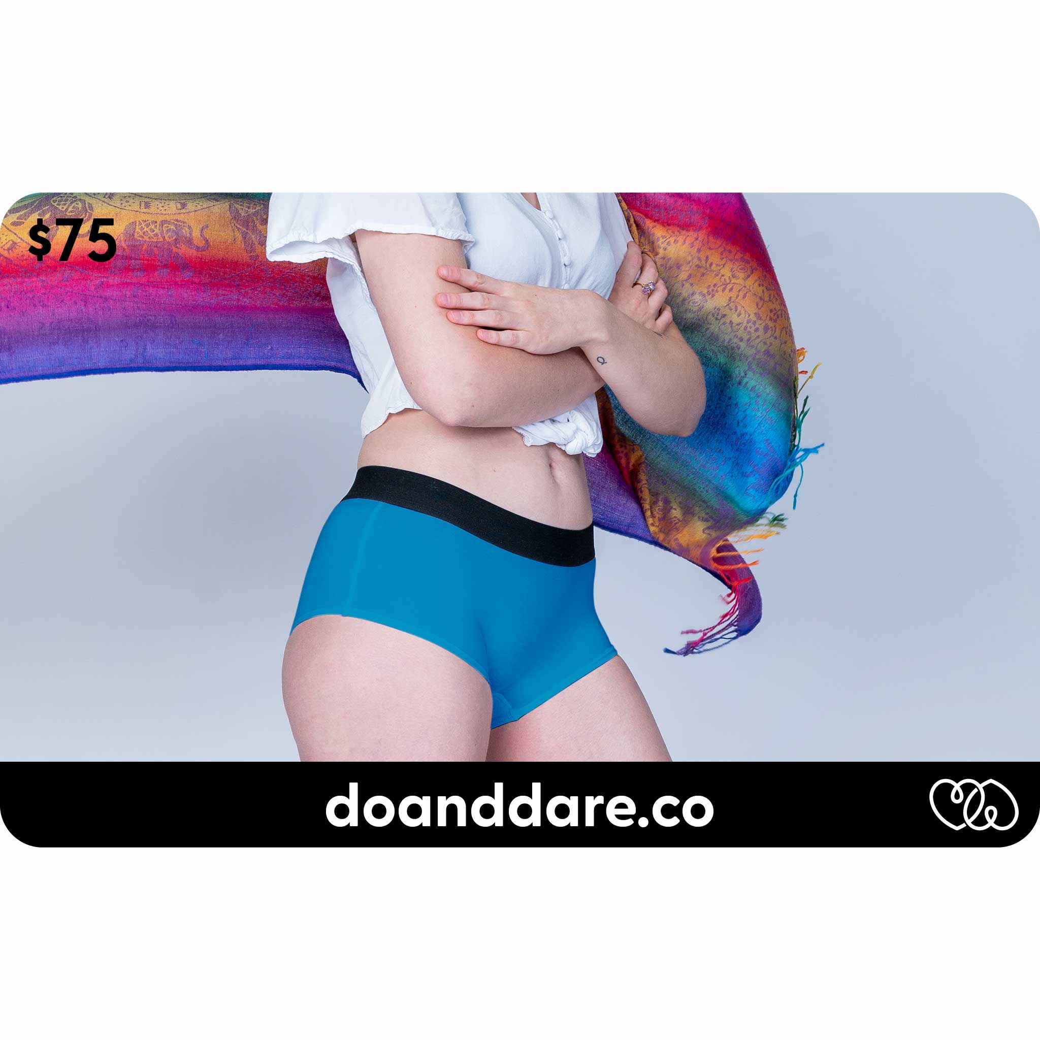 do+dare undie co. - $75 gift card showing sarah wearing electric blue boyshort underwear with a rainbow scarf in the background